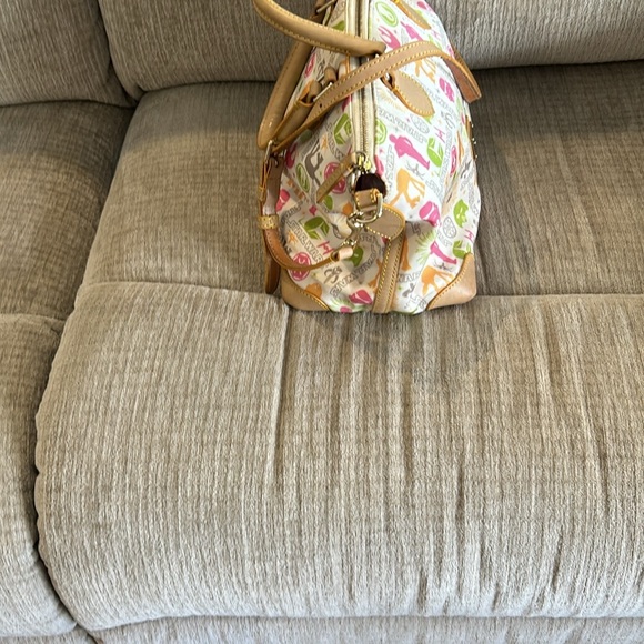 Dooney and Bourke disney’s Star Wars on the light side bag Crossbody
10 x 14 x 6 - Picture 4 of 11